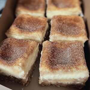 Indulgent Cinnamon Churro Cheesecake Bars Recipe