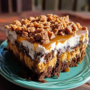 Butterfinger Candy Bar Poke Cake Recipe