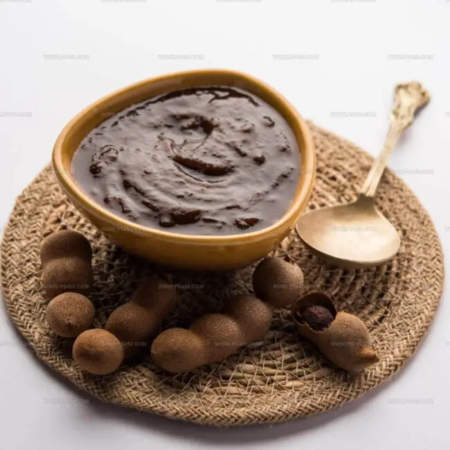 The Mix of Fish Sauce, Soy Sauce, Tamarind Paste, Ketchup, Apple Cider Vinegar, and Allspice